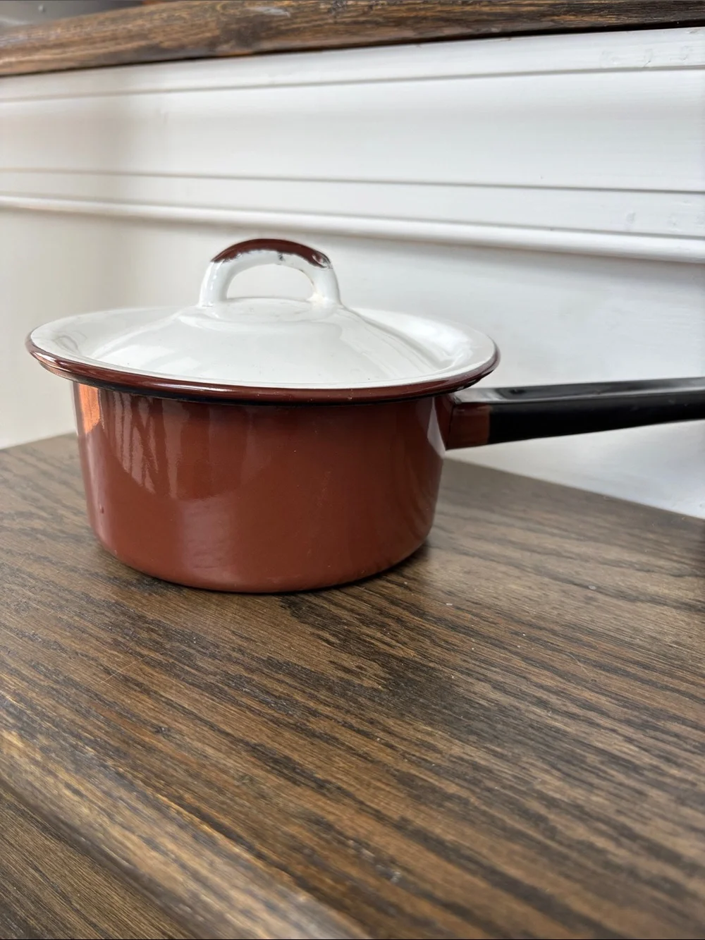 Vintage enamelware small sauce pan w/lid, dark brown /white, 11.5” long, 3” tall